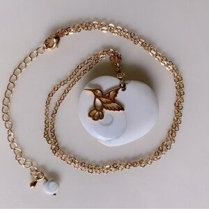 Gold toned hummingbird Pendant Necklace